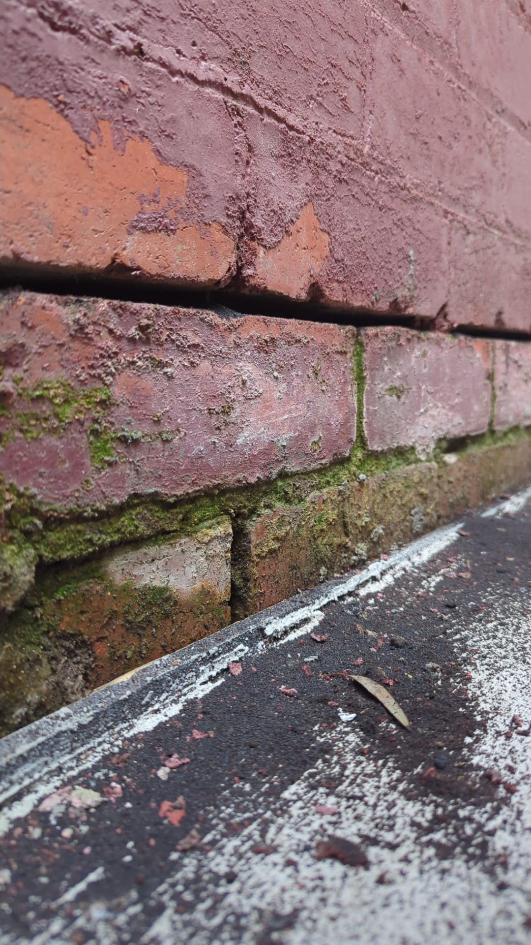 Close-up of deteriorated mortar joints, open gaps and weathered brickwork on a Melbourne brick wall assessed by MMR