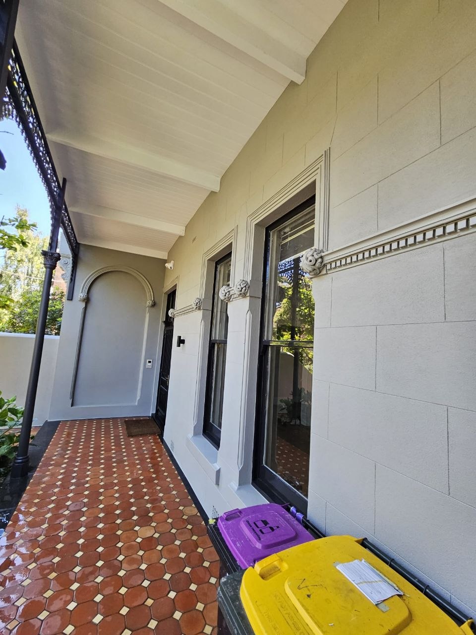 Restored heritage render with ornamental corbels and arched alcove, Melbourne VIC