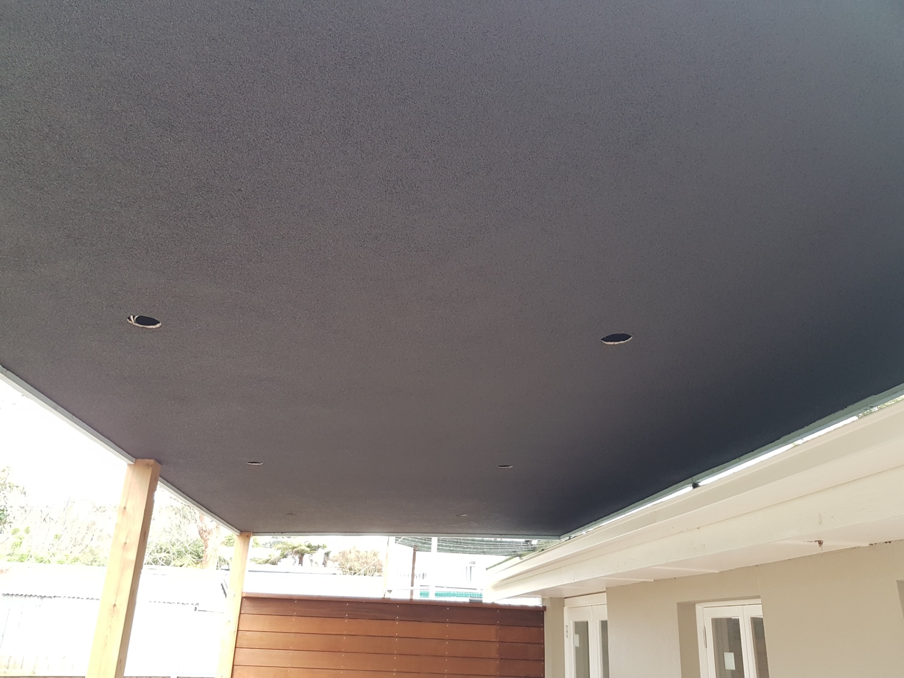 Dark textured soffit render finish on outdoor ceiling, Melbourne VIC