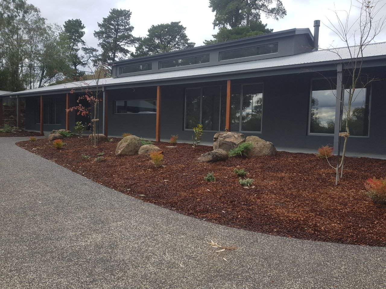 Rendered charcoal-grey home exterior, Melbourne rendering project by Melbourne Maintenance and Repairs