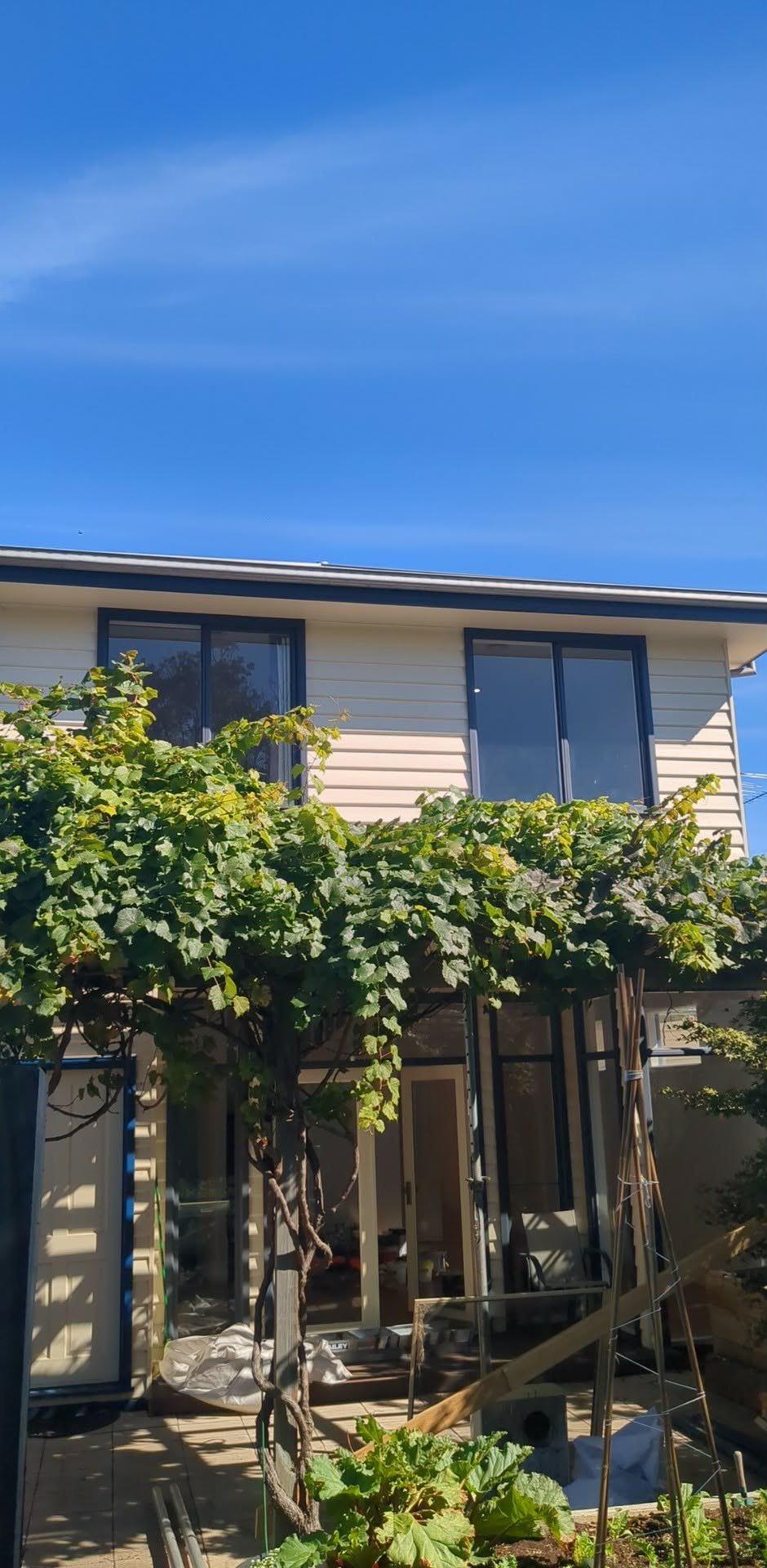 Side elevation of the Newport weatherboard home after exterior painting