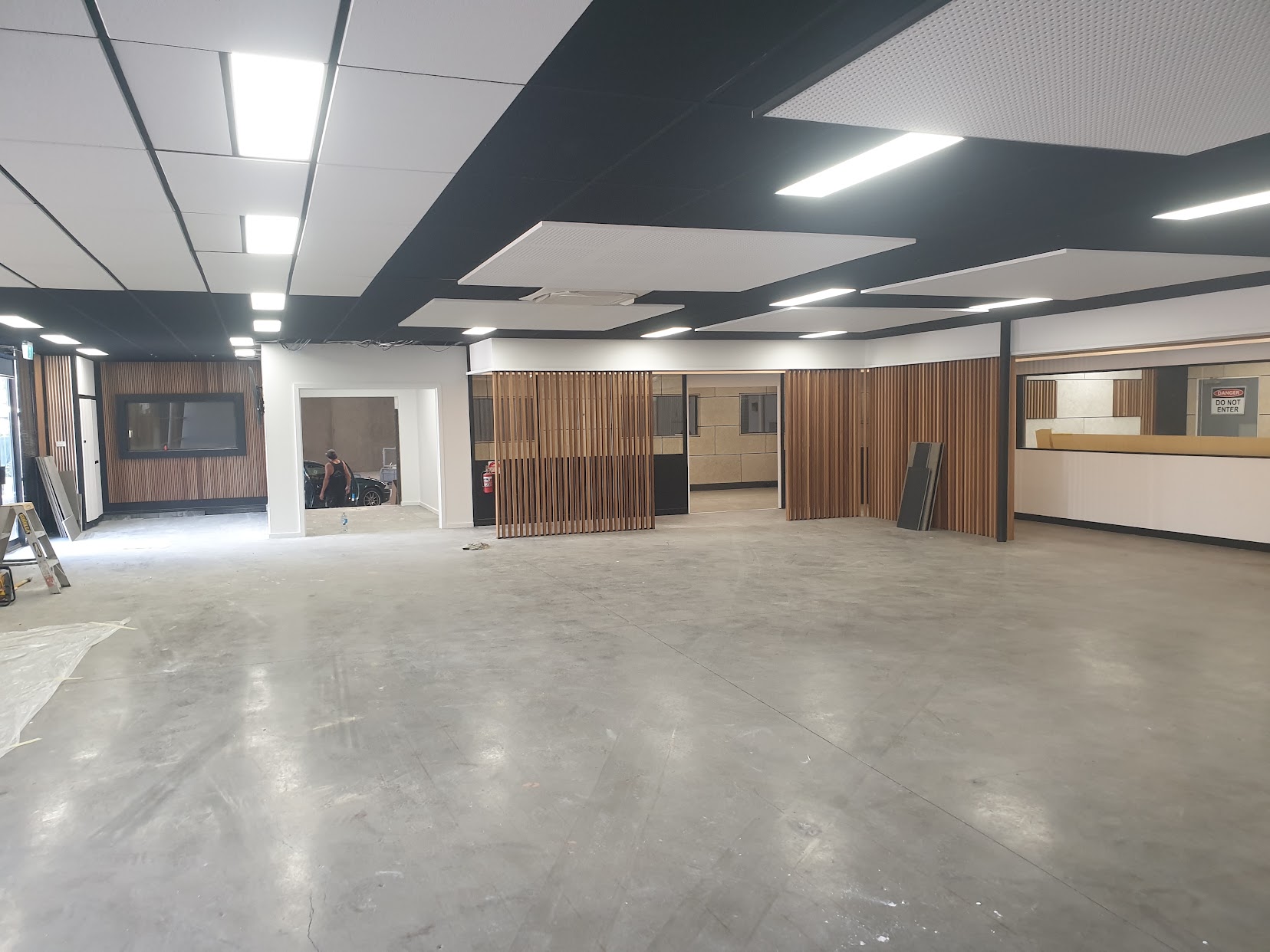 Timber slat feature walls in a completed commercial interior — MMR carpentry Melbourne