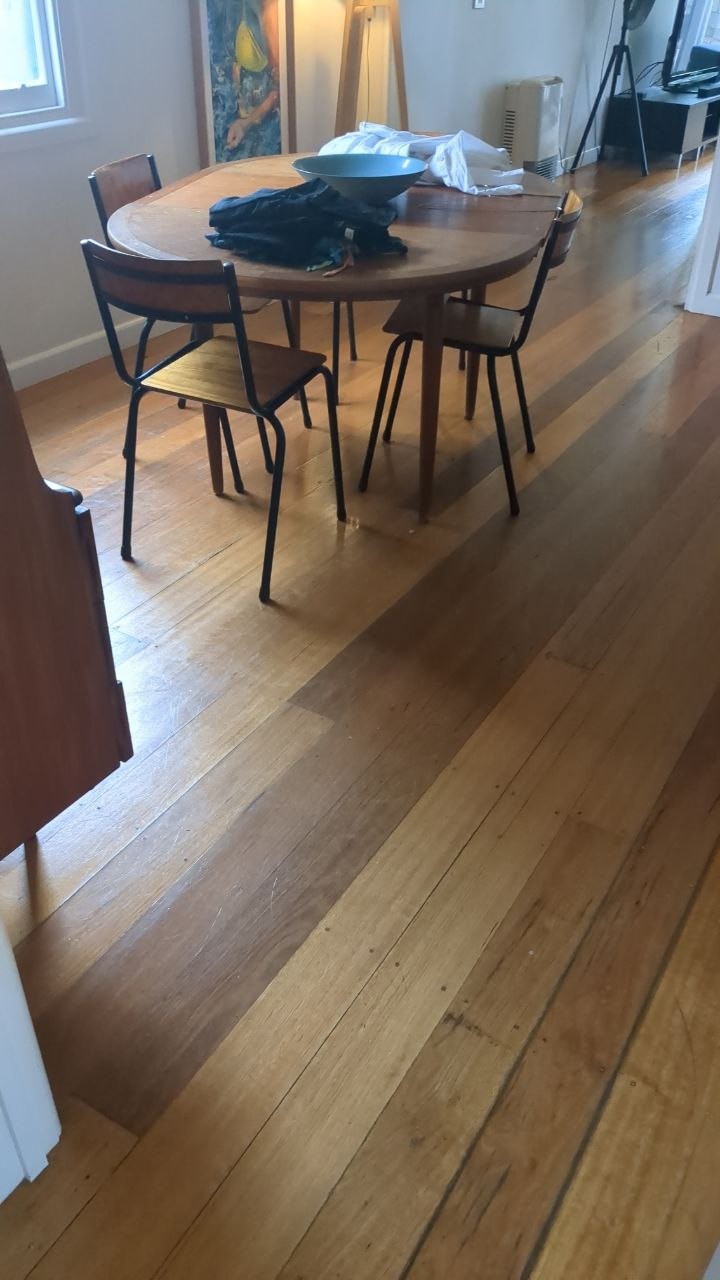 Dining area timber floor before sanding and sealing