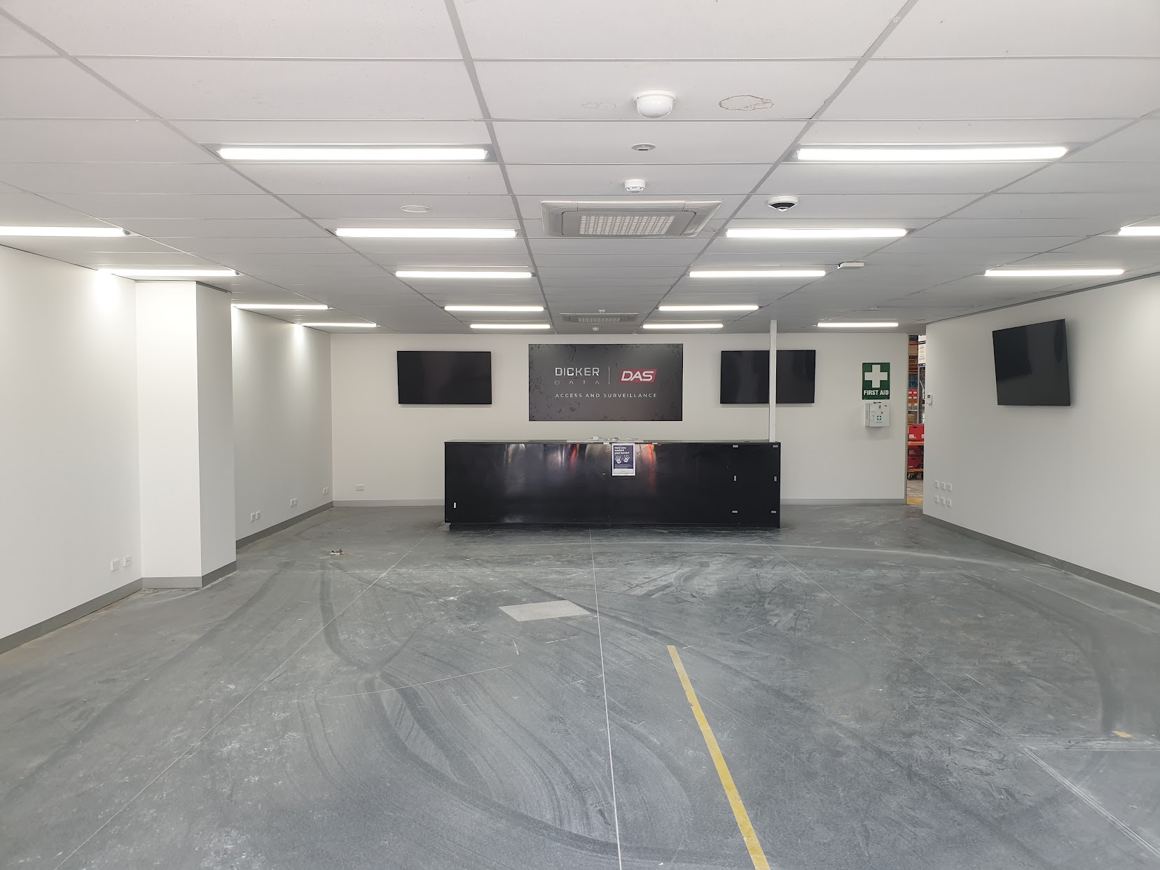 Completed commercial fit-out with reception counter — MMR commercial carpentry Melbourne